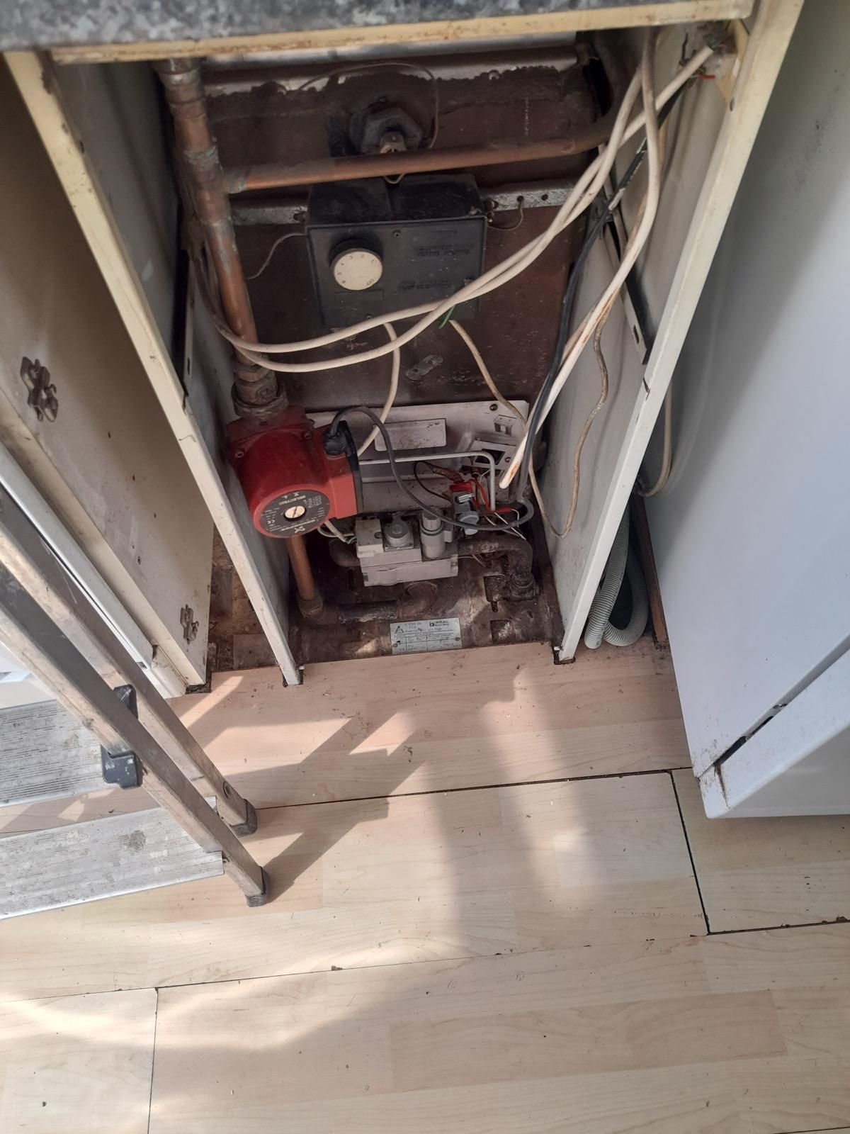 Old floor-standing boiler before replacement