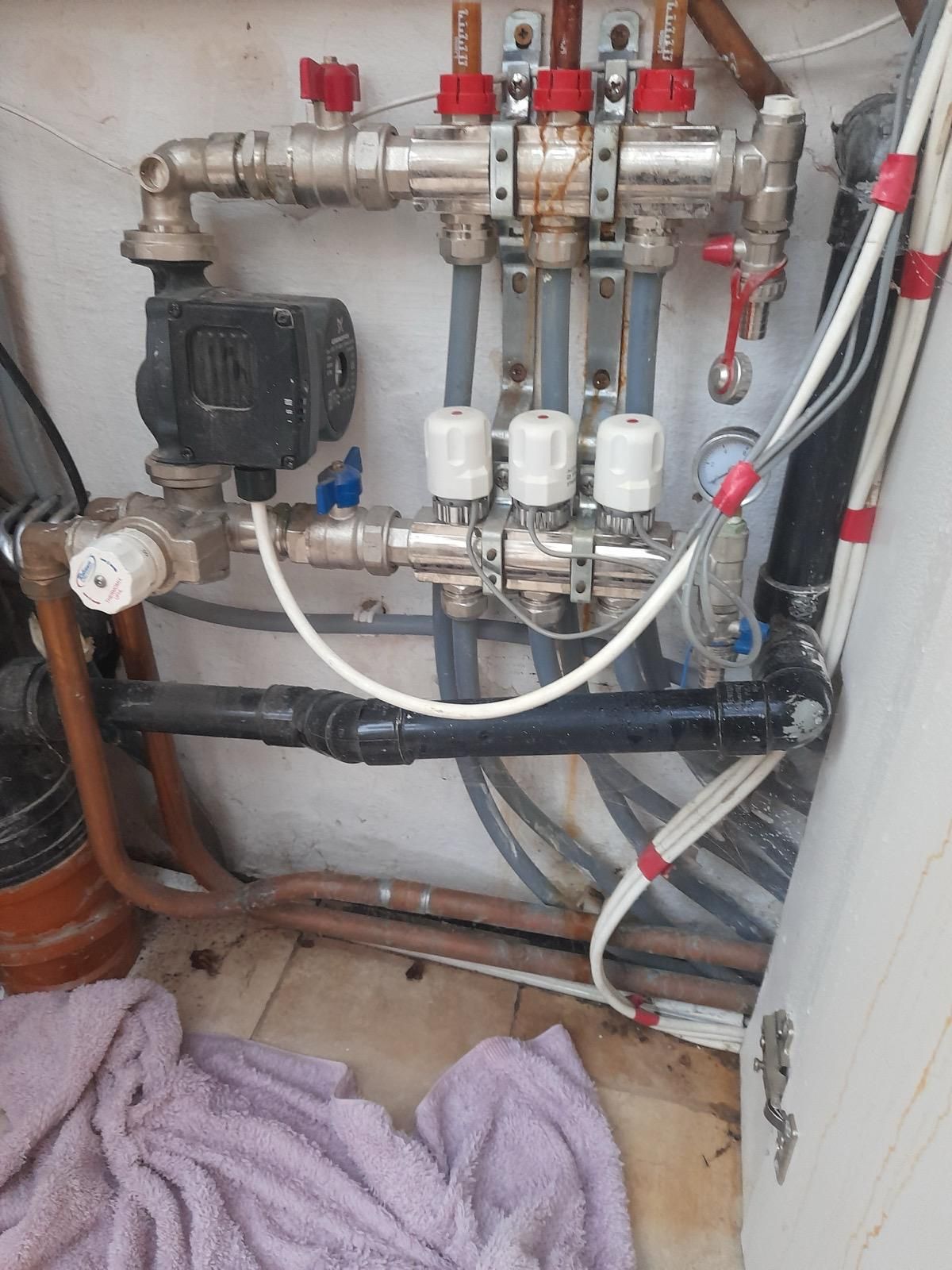 Underfloor heating manifold installed