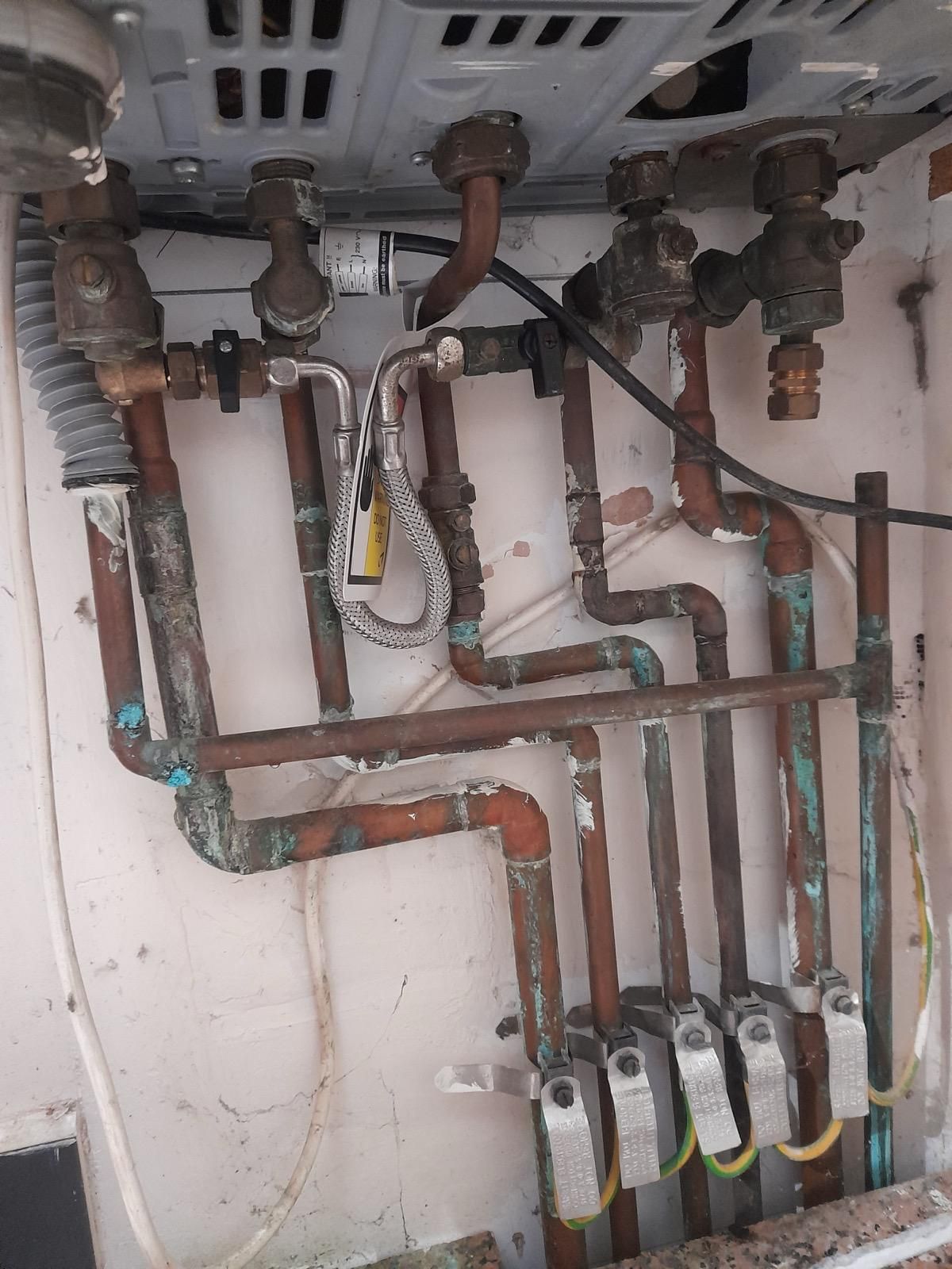 Corroded old pipework before re-run